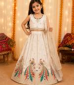 White embroidered girls lehenga choli set in art silk with tawil net dupatta for wedding