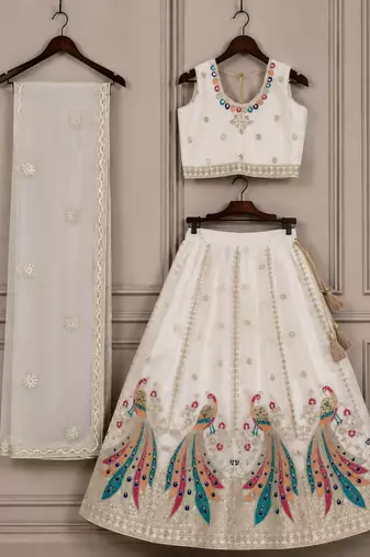 White embroidered girls lehenga choli set in art silk with tawil net dupatta for wedding