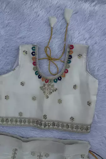 White embroidered girls lehenga choli set in art silk with tawil net dupatta for wedding