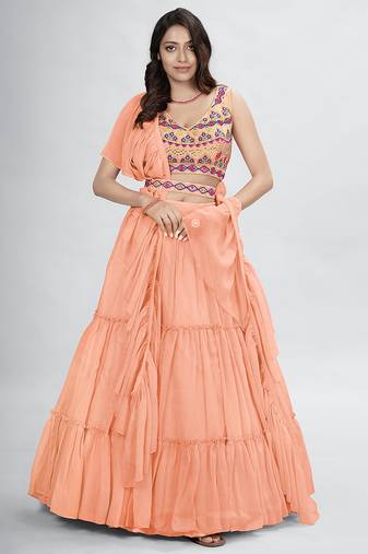 Peach lehenga with sphagetti blouse