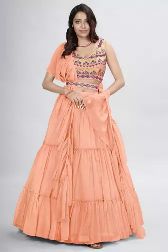 Peach lehenga with sphagetti blouse