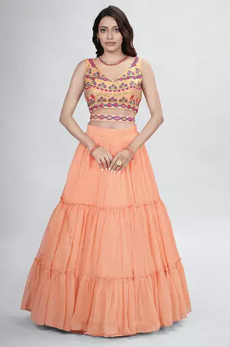 Peach lehenga with sphagetti blouse