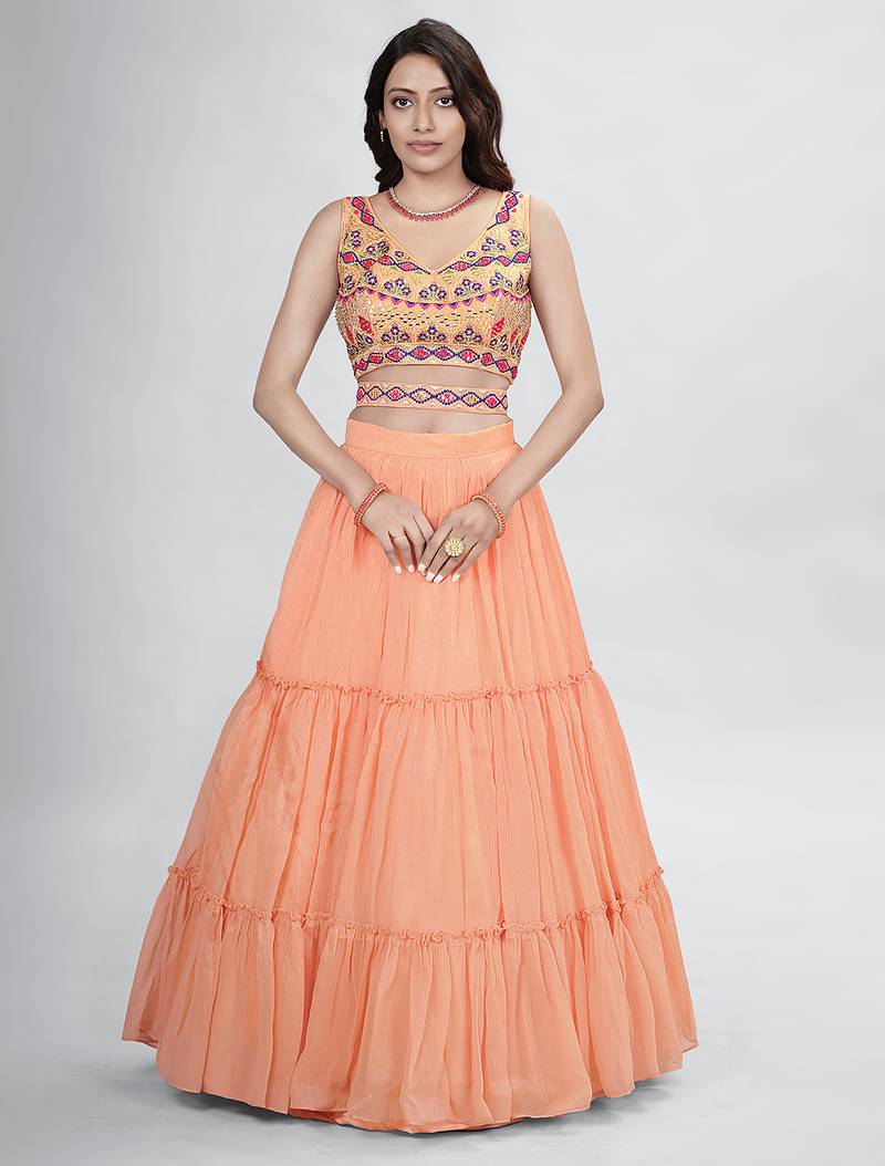 Peach lehenga with sphagetti blouse
