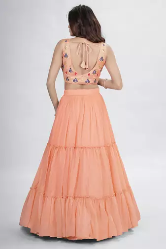 Peach lehenga with sphagetti blouse