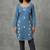 Blue embroidered kurti with dark trousers