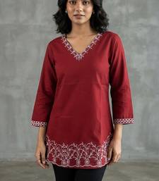Elegant red and white embroidered short kurti