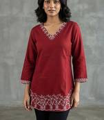 Elegant red and white embroidered short kurti