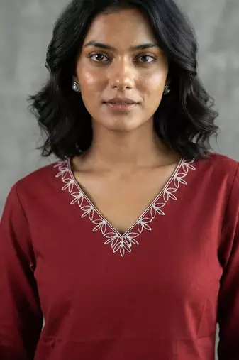 Elegant red and white embroidered short kurti