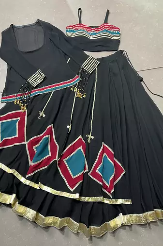 black lace and cowrie bell detailed georgette lehenga set