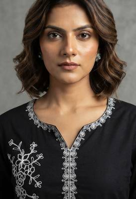 Elegant black and white embroidered kurti 3