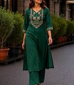 Cotton blend bottle green embroidered kurta with pant set for women
