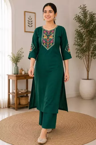 Cotton blend bottle green embroidered kurta with pant set for women