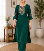 Cotton blend bottle green embroidered kurta with pant set for women