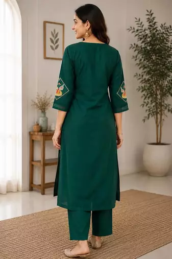 Cotton blend bottle green embroidered kurta with pant set for women