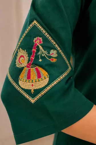 Cotton blend bottle green embroidered kurta with pant set for women