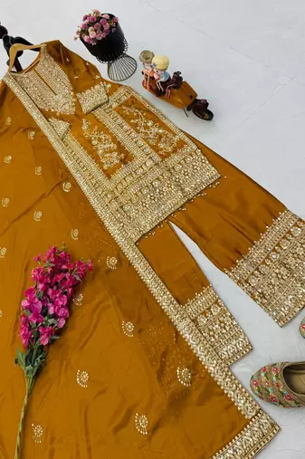 yellow designer party wear top pant & dupatta set