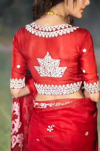 Red color Oregenza embroidered saree with un-stitched blouse
