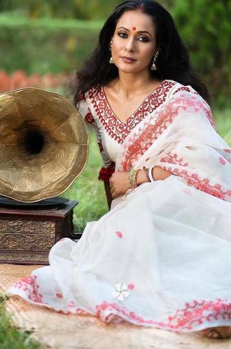 White color Oregenza embroidered saree with un-stitched blouse