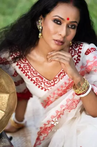White color Oregenza embroidered saree with un-stitched blouse