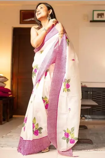 white & pink color linen printed zari border sarees