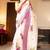 white & pink color linen printed zari border sarees