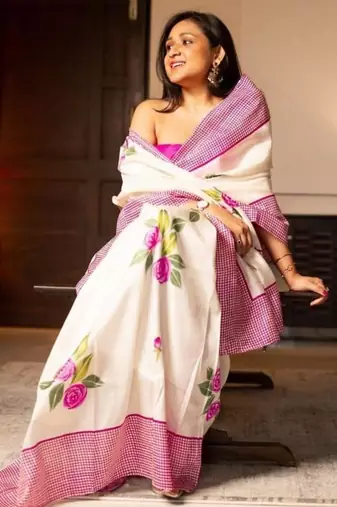 white & pink color linen printed zari border sarees