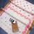 white & pink orange color linen printed zari border sarees