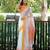 white yellow color linen durga pooja sarees