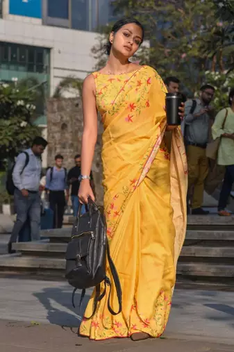 yellow color linen digital printed saree with running print blouse