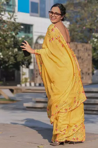 yellow color linen digital printed saree with running print blouse