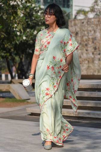 pista green color linen digital printed saree with running print blouse
