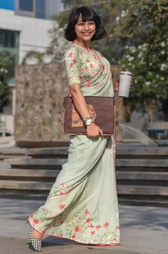pista green color linen digital printed saree with running print blouse