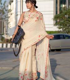 cream color linen digital printed saree with running print blouse