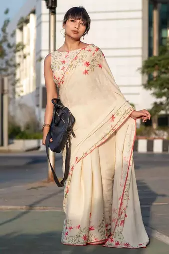 cream color linen digital printed saree with running print blouse