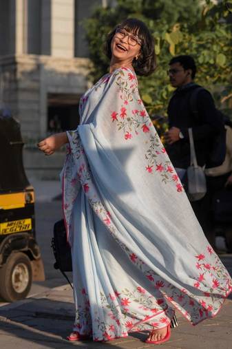 blue color linen digital printed saree with running print blouse