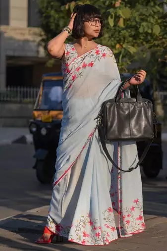 blue color linen digital printed saree with running print blouse
