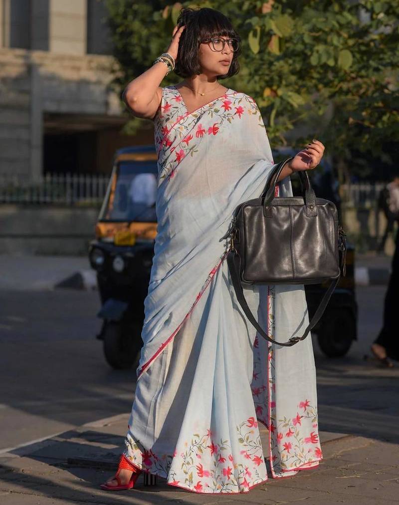 blue color linen digital printed saree with running print blouse