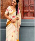 light chiku  pink color linen zari kerela border sarees