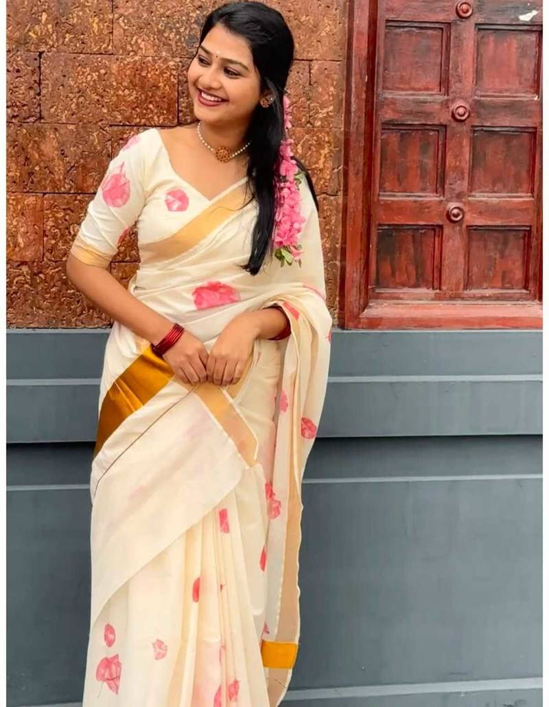 light chiku  pink color linen zari kerela border sarees