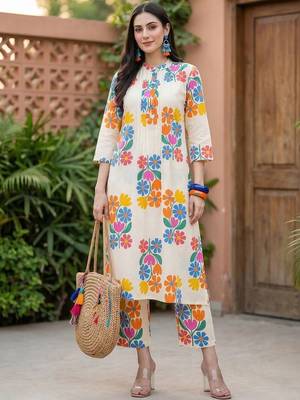 Women Floral Printed Regular Pure Cotton Kurta with Trousers 1