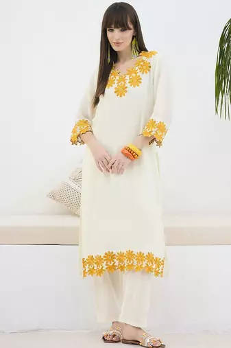 Women Floral Embroidered Cotton Kurta with Trousers