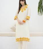 Women Floral Embroidered Cotton Kurta with Trousers