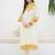 Women Floral Embroidered Cotton Kurta with Trousers