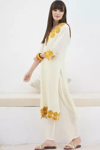 Women Floral Embroidered Cotton Kurta with Trousers