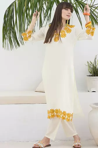 Women Floral Embroidered Cotton Kurta with Trousers