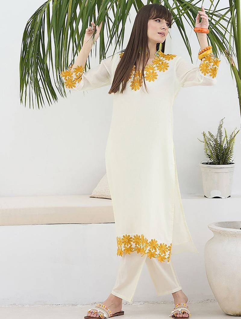 Women Floral Embroidered Cotton Kurta with Trousers
