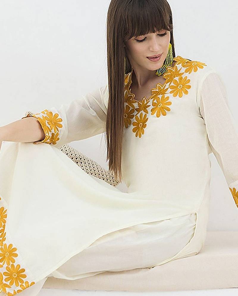 Women Floral Embroidered Cotton Kurta with Trousers
