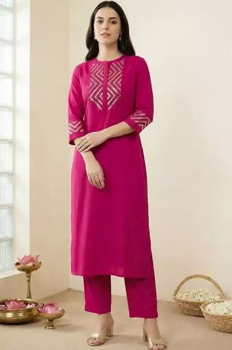Women Printed Regular Sequinned Kurta with Trousers