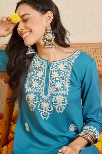 Women Ethnic Motifs Embroidered Regular Thread Work Kurta with Trousers