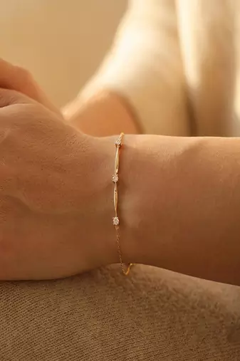 Elegant Gold Tone Slim Chain Bracelet with Clear Crystal Accents